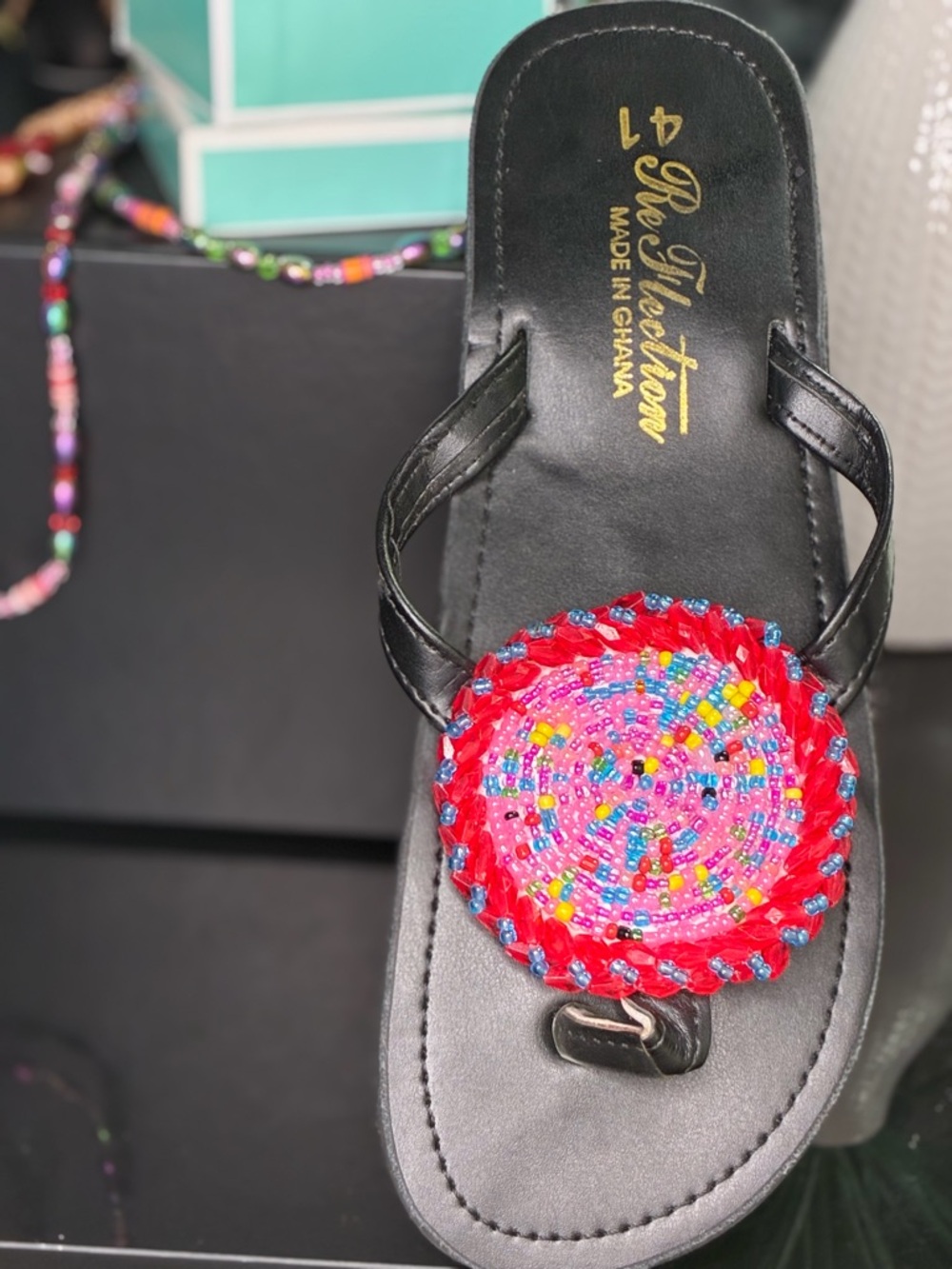Women’s Black Sandal with Red Beaded Medallion